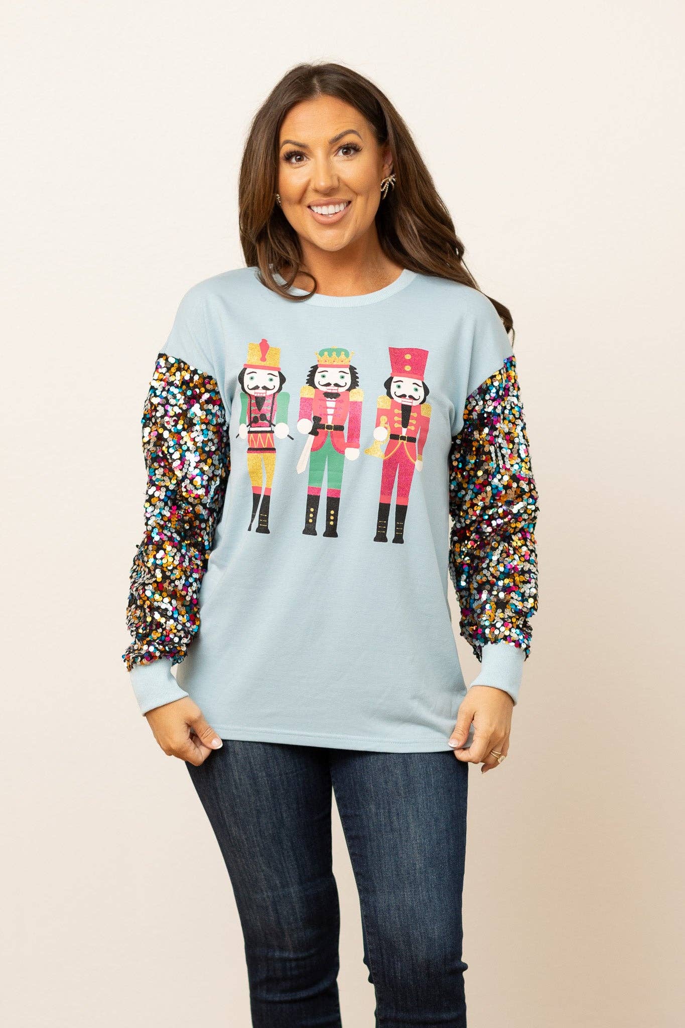 Nutcrackers on Blue Top with Sequin Sleeves