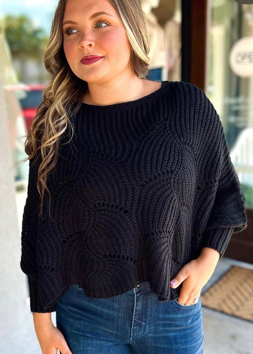 Chunky knit black batwing sweater perfect for layering over dresses or denim