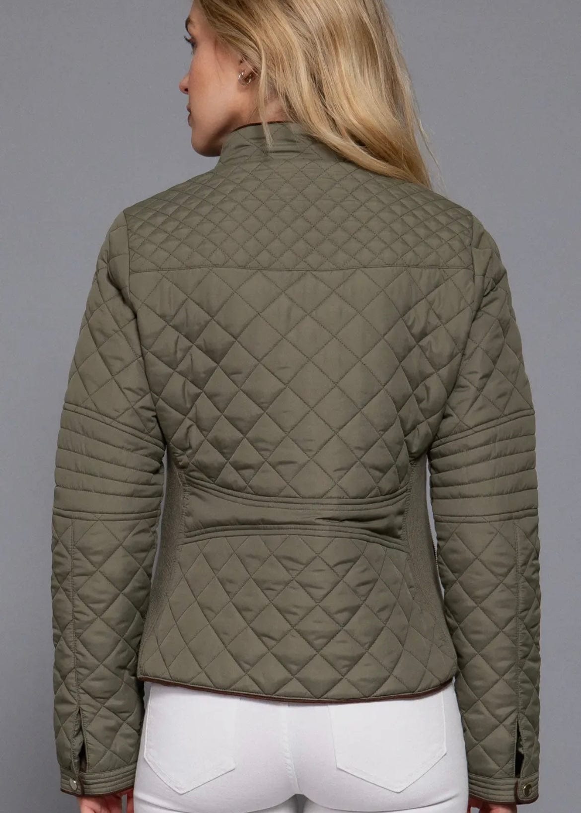 Back view of olive green quilted jacket showing diamond stitch pattern