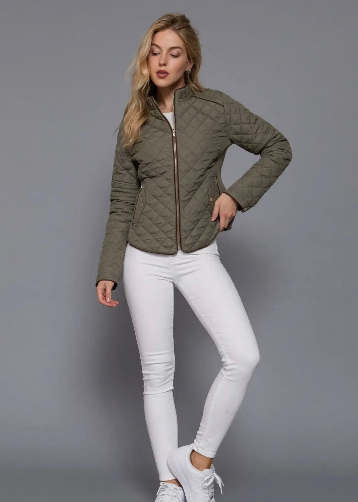 Model wearing full olive quilted jacket outfit – fall wardrobe staple